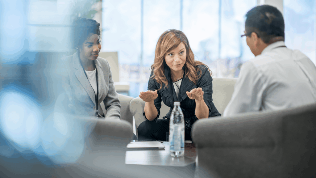 manager discussing organisational capability with peers